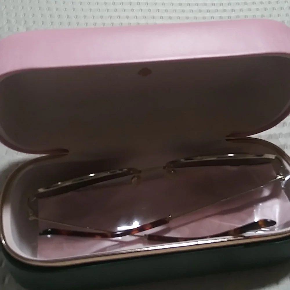 New Kate Spade New York sunglasses.
